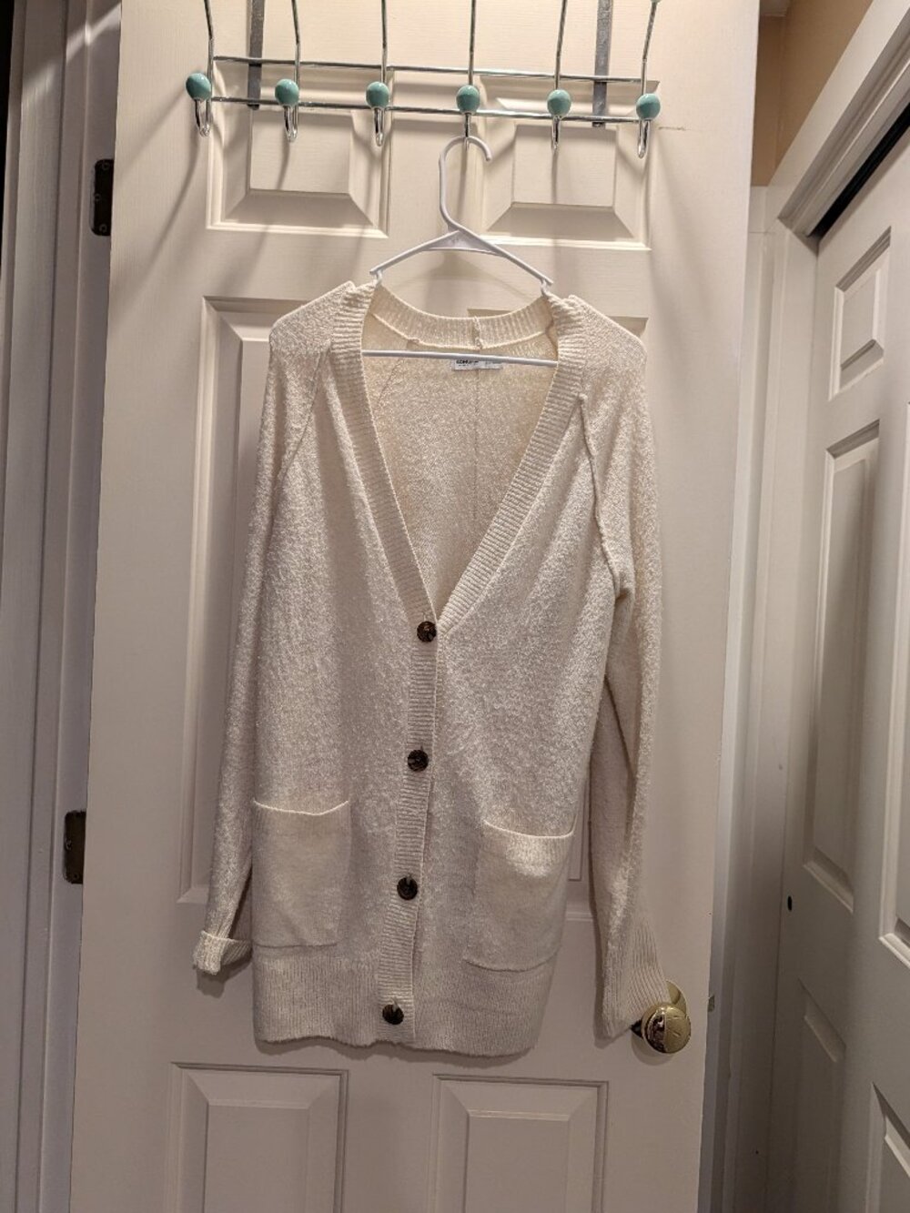 White cardigan sweater brown button down, a roomy and oversized XS